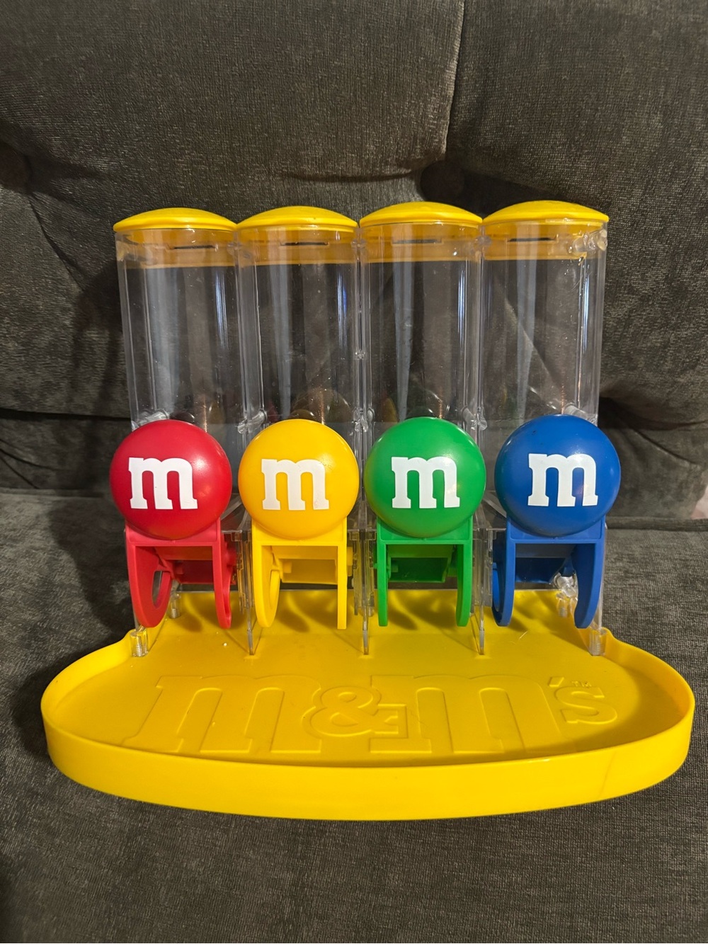 M&M'S Yellow Base 4-Canister Candy Dispenser with Red, Yellow, Green, Blue Tops